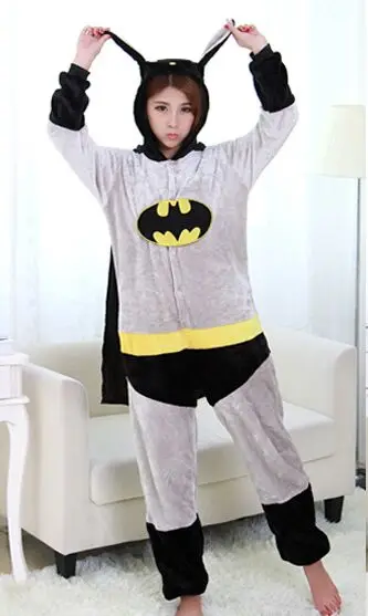 Model wearing a grey-and-black Batman hooded Kigurumi Onesie with a cape